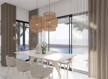 Апартаменты и виллы для инвестиций, 53-197м², в рассрочку от застройщика, в 200 м от моря в Бахчели, Северный Кипр ID-14951 фото-2