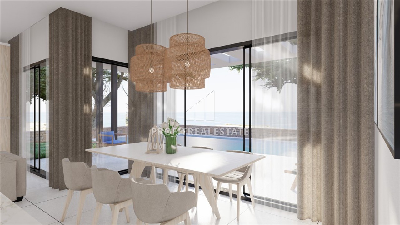 Апартаменты и виллы для инвестиций, 53-197м², в рассрочку от застройщика, в 200 м от моря в Бахчели, Северный Кипр ID-14951 фото-2
