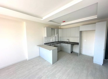 One bedroom apartment, 60m², in a comfortable new building in the Tomyuk area, Mersin ID-14976 фото-5