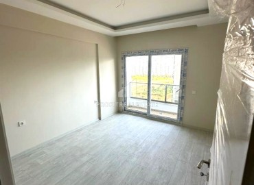 One bedroom apartment, 60m², in a comfortable new building in the Tomyuk area, Mersin ID-14976 фото-6