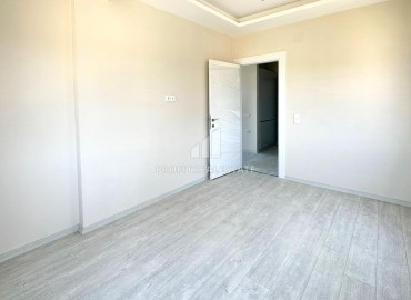 One bedroom apartment, 60m², in a comfortable new building in the Tomyuk area, Mersin ID-14976 фото-7