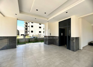 One bedroom apartment, 60m², in a comfortable new building in the Tomyuk area, Mersin ID-14976 фото-11