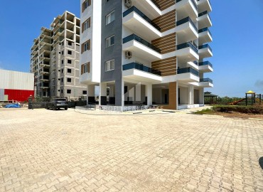 One bedroom apartment, 60m², in a comfortable new building in the Tomyuk area, Mersin ID-14976 фото-14