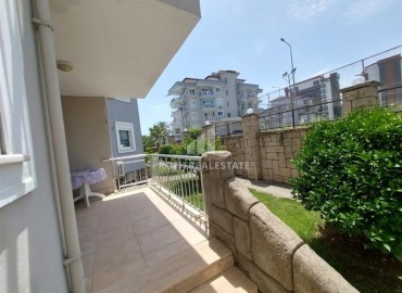 One-bedroom apartment with access to the garden, 90m², in a comfortable residence in a quiet area of Alanya - Cikcilli ID-14980 фото-11