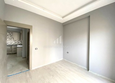Квартира с одной спальней, 65м², на высоком этаже в 300м от моря в Эрдемли, Арпачбахшиш ID-14981 фото-11