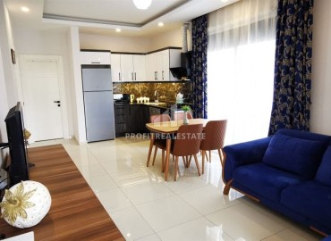 Inexpensive cozy furnished apartment 1+1, 55m², 400 meters from the sea, in a residence with facilities, Mahmutlar, Alanya ID-15007 фото-7