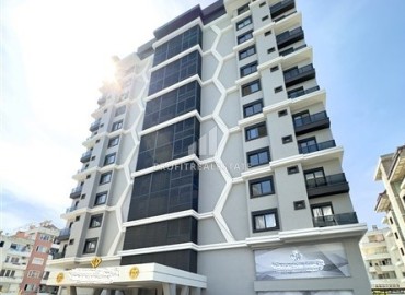 Стильная дизайнерская квартира 1+1, 50м², в 300 метрах от моря, в новом жилом комплексе, в центре Махмутлара, Аланья ID-15008 фото-1