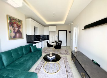 Стильная дизайнерская квартира 1+1, 50м², в 300 метрах от моря, в новом жилом комплексе, в центре Махмутлара, Аланья ID-15008 фото-6
