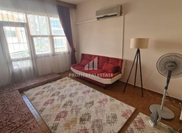 Inexpensive furnished two bedroom apartment 120 m², with a separate kitchen, 250 m from the sea, Mahmutlar, Alanya ID-15009 фото-1