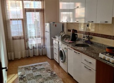 Inexpensive furnished two bedroom apartment 120 m², with a separate kitchen, 250 m from the sea, Mahmutlar, Alanya ID-15009 фото-2