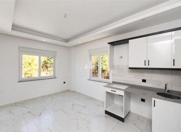 Недорогая меблированная двухкомнатная квартира 50м², без мебели, в новом комплексе с инфраструктурой в Конаклы, Алания ID-15010 фото-3
