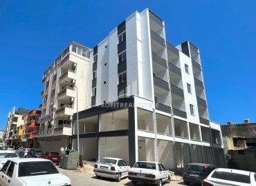 One bedroom apartment, 55m², in a gasified residence under construction in the center of Erdemli ID-15028 фото-1