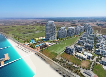 Уникальное предложение для инвестиций по низкой цене: апартаменты 34-230м2, на первой береговой линии. Район Газиверен, Северный Кипр ID-14639 фото-1