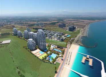 Уникальное предложение для инвестиций по низкой цене: апартаменты 34-230м2, на первой береговой линии. Район Газиверен, Северный Кипр ID-14639 фото-12