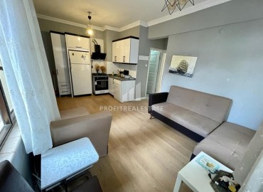 Уютная двухкомнатная квартира, 60м², в доме городского типа всего в 50м от моря в районе Алании Тосмур ID-15042 фото-3