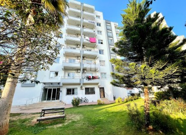 One-bedroom apartment, 60m², in a residence with a swimming pool in the center of Yenisehir, Mersin ID-15057 фото-2