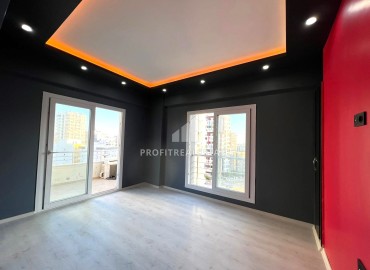 One-bedroom apartment, 60m², in a residence with a swimming pool in the center of Yenisehir, Mersin ID-15057 фото-3
