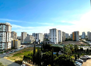 One-bedroom apartment, 60m², in a residence with a swimming pool in the center of Yenisehir, Mersin ID-15057 фото-11