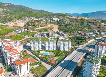 Elegant furnished apartment 2+1, 118 m2, with glazed balcony, in a residence with facilities, Cikcilli, Alanya ID-15065 фото-2