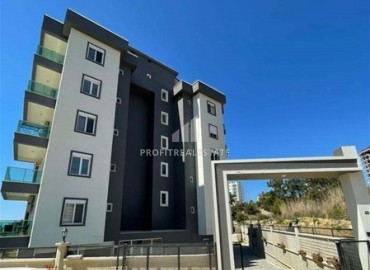 Частично меблированная двухкомнатная квартира 55м², в жилой резиденции с инфраструктурой в Авсалларе, Аланья ID-15069 фото-1