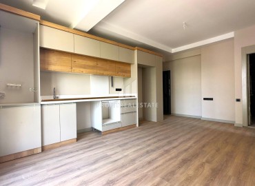 Двухкомнатная квартира, 55м², с чистовой отделкой в малоквартирной резиденции в Мезитли, Мерсин ID-15071 фото-5