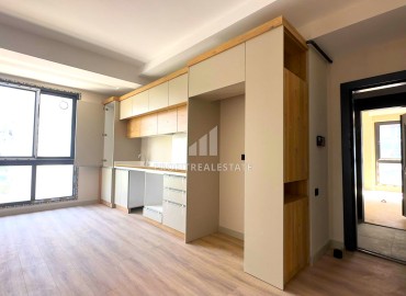Двухкомнатная квартира, 55м², с чистовой отделкой в малоквартирной резиденции в Мезитли, Мерсин ID-15071 фото-6
