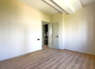 Двухкомнатная квартира, 55м², с чистовой отделкой в малоквартирной резиденции в Мезитли, Мерсин ID-15071 фото-10