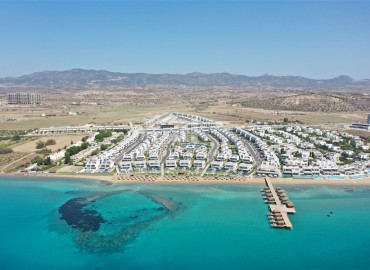 Large-scale project with high investment potential, 150 meters from the sea, in Iskele, Famagusta, Northern Cyprus, 48-80 m2 ID-15075 фото-1
