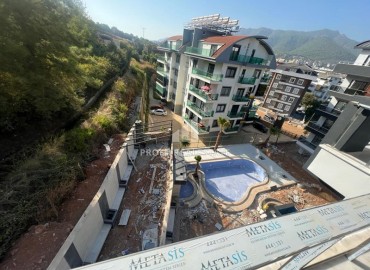 One bedroom apartment, 60m², in a residence with facilities in the final stage of construction in Oba, Alanya ID-15085 фото-9