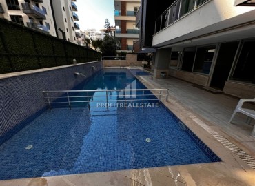 Spacious one bedroom apartment, 70m², 200m from the sea in Mahmutlar, Alanya, at an attractive price ID-15094 фото-15