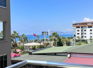 Stylish one-bedroom apartment with designer interior 63m², overlooking the sea, 50 m from the beach, Alanya ID-15102 фото-2
