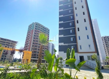 One bedroom apartment, 55m², in a residence with facilities in the final stage of construction in Teje, Mersin ID-15117 фото-2