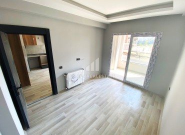 One bedroom apartment, 55m², in a residence with facilities in the final stage of construction in Teje, Mersin ID-15117 фото-11