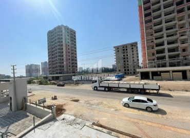 One bedroom apartment, 55m², in a residence with facilities in the final stage of construction in Teje, Mersin ID-15117 фото-14