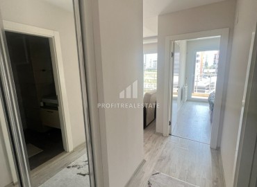 Furnished one-bedroom apartment, 60m², in a residence with a swimming pool, 300m from the sea in the Davultepe area of Mersin ID-15120 фото-3