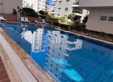 Меблированные трехкомнатные апартаменты, 110м², в 150м от моря, на центральной улице Махмутлара, Алания ID-15122 фото-13