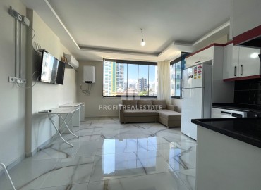 New gasified apartment 1+1, 50m², in an urban building, 100 meters from the sea in the Teje area, Mersin ID-15128 фото-5
