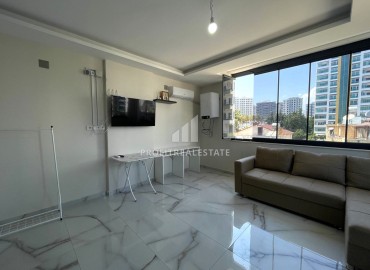 New gasified apartment 1+1, 50m², in an urban building, 100 meters from the sea in the Teje area, Mersin ID-15128 фото-6