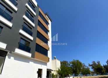 Новая газифицированная квартира 1+1, 50м², в доме городского типа, в 100 метрах от моря в районе Тедже, Мерсин ID-15128 фото-14