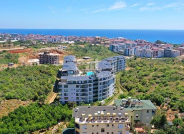 Ready-to-move-in bright one-bedroom apartment 55m², 450 meters from the sea in Kestel, Alanya ID-15135 фото-3