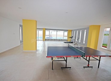 Квартира 1+1 в новом комплексе с хорошим месторасположением недалеко от большого Мигроса в районе Алании Махмутлар ID-1171 фото-4