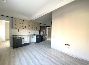 Двухкомнатная квартира, 55м², в новом малоквартирном комплексе в Куйулук, район Мезитли ID-15140 фото-4