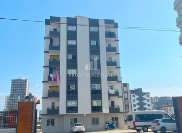 One bedroom apartment, 55m², in a new small apartment residence in Kuyuluk, Mezitli district ID-15140 фото-10