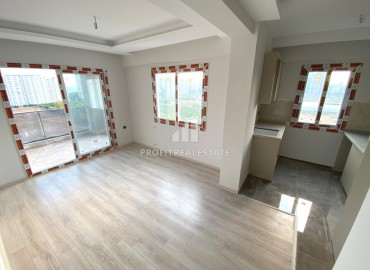 One bedroom apartment, 60m², in a residence at the final stage of construction in the Tomyuk area, Mersin ID-15156 фото-4