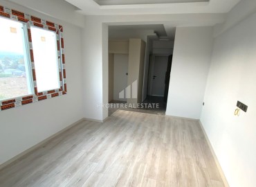 One bedroom apartment, 60m², in a residence at the final stage of construction in the Tomyuk area, Mersin ID-15156 фото-5