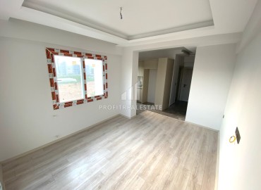 One bedroom apartment, 60m², in a residence at the final stage of construction in the Tomyuk area, Mersin ID-15156 фото-6