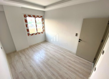 One bedroom apartment, 60m², in a residence at the final stage of construction in the Tomyuk area, Mersin ID-15156 фото-12
