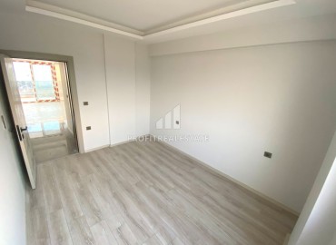 One bedroom apartment, 60m², in a residence at the final stage of construction in the Tomyuk area, Mersin ID-15156 фото-13