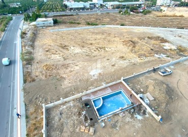 One bedroom apartment, 60m², in a residence at the final stage of construction in the Tomyuk area, Mersin ID-15156 фото-15