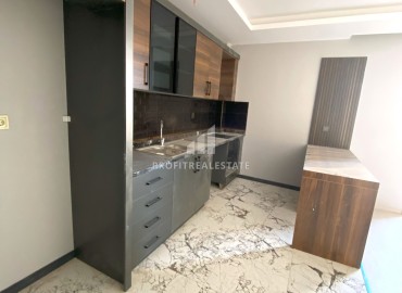 Стильная квартира с двумя спальнями, 110м², в новом комплексе с бассейном в районе Томюк, Мерсин ID-15158 фото-5
